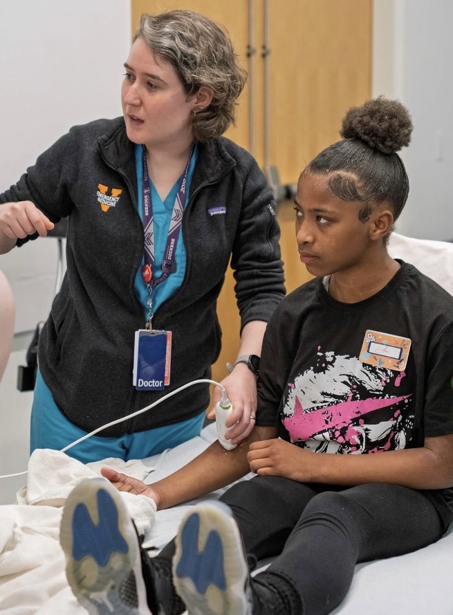 UVA Emergency Medicine resident teaching ultrasound
